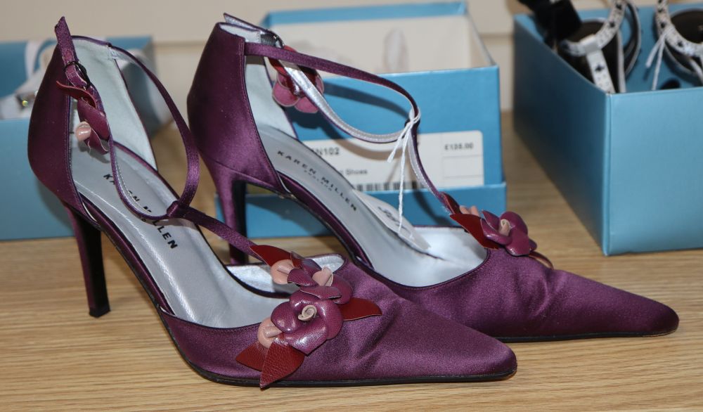A pair of Karen Millen purple silk stiletto T strap shoes, decorated with leather flowers, size 37, (boxed)